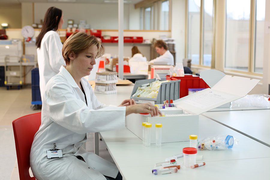 assembly of biological sample collection kits 